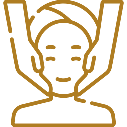 Icon of a person receiving a facial massage or skincare treatment.